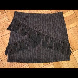 Cool black textured mini skirt with fringe detail